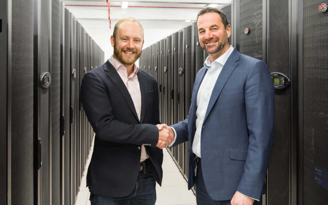 Quentin Martin and David Artus shake hand over the new partnership between Domicilium and Luckbox.
